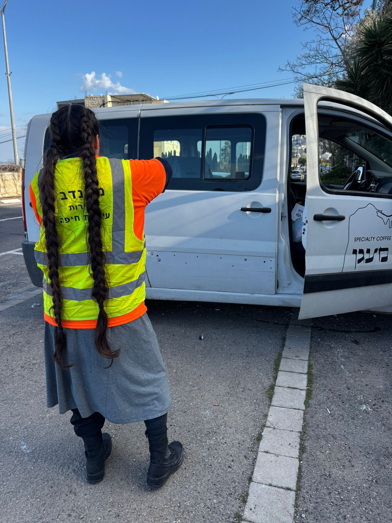 Judy volunteering in her Haifa relief vest during the war